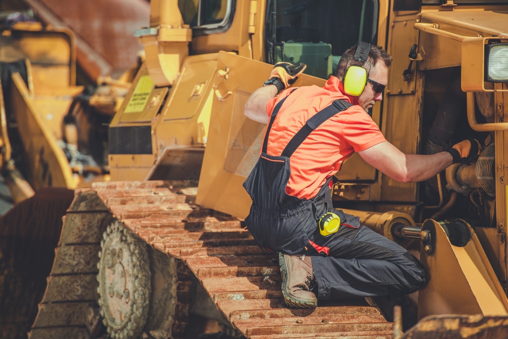 Bulldozer,Professional,Mechanic.,Caucasian,Technician,Taking,Machine,Under,Maintenance.,Construction